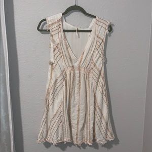 Elegant Cream Sleeveless Dress